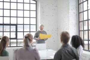 Older gentleman giving a speech.