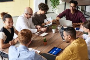 People meeting at a table.